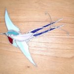 ... ergibt es  einen schönen bunten Vogel
